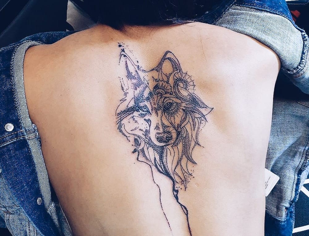 Wolf back tattoo
