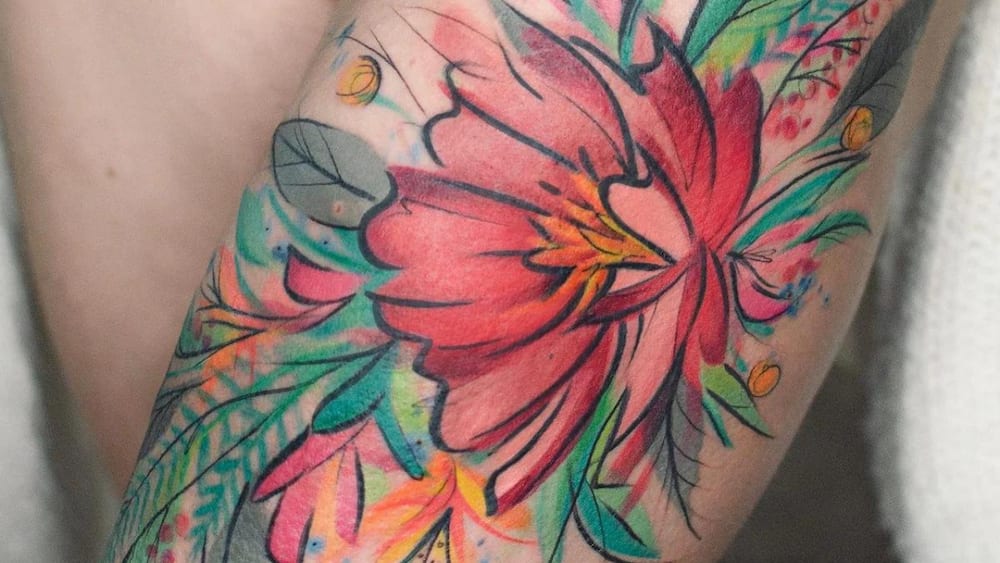 Giant daisy tattoo
