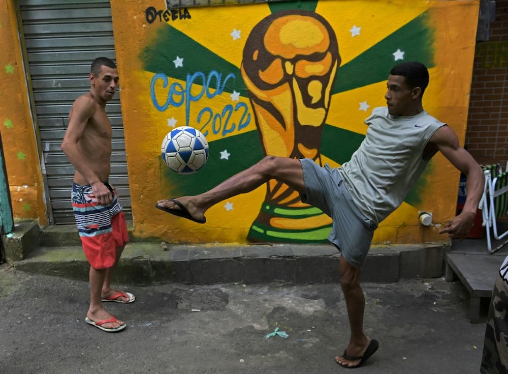 World Cup fever is heating up in Rio de Janeiro's biggest favela, Rocinha -- and across Brazil