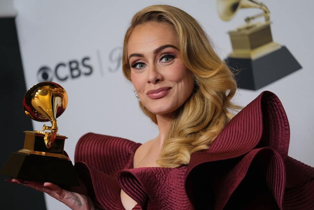 English singer-songwriter Adele poses with the award for Best Pop Solo Performance for "Easy on Me" in the press room during the 65th Annual Grammy Awards at the Crypto.com Arena in Los Angeles on February 5, 2023.