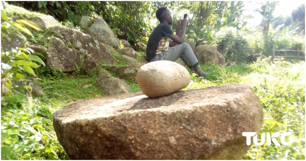 Grinding stone. Photo: Collins Mmbulika/TUKO.co.ke.