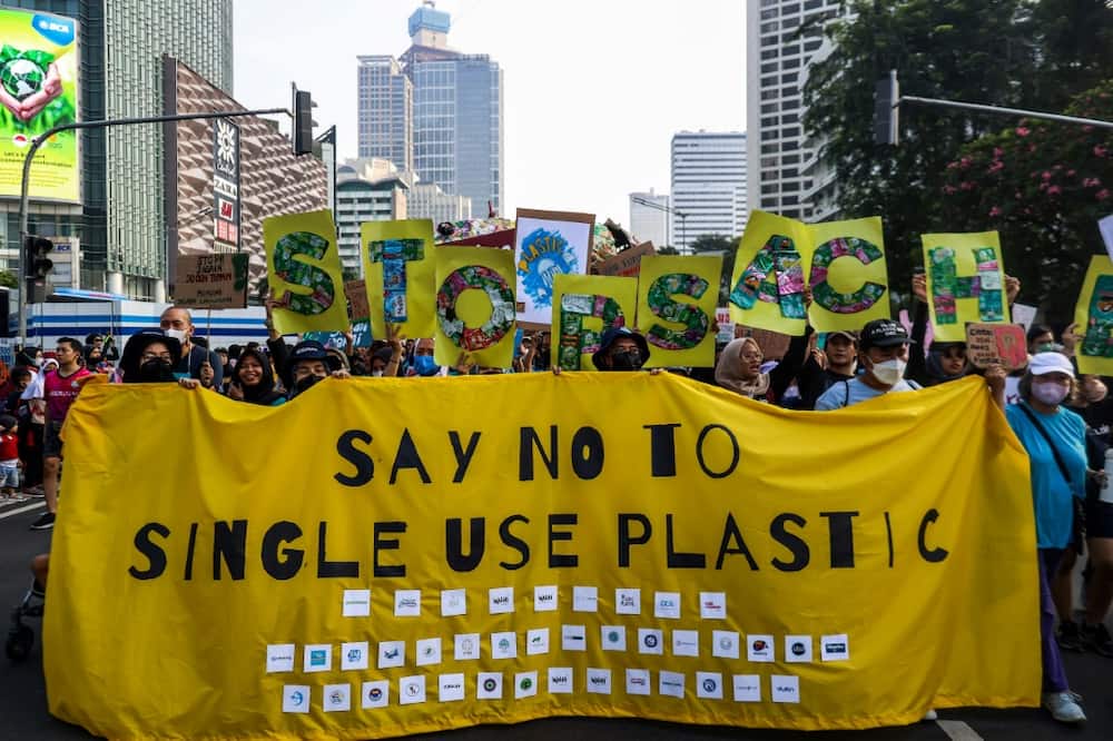 Environmental activists attend a rally to protest against single-use plastic products in Jakarta in July 2022