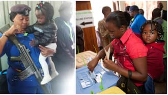 Election in Kenya: Huruma Female Police Officer Shows Humanity by Holding Baby for Woman Casting Her Vote in Mathare
