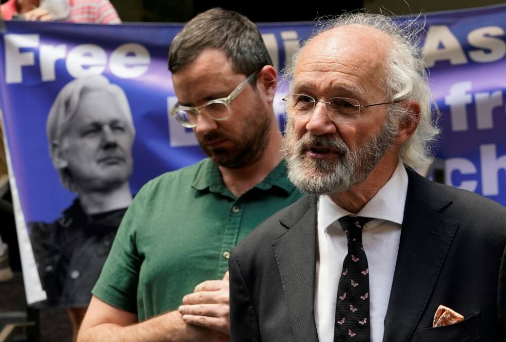 Julian Assange's father John Shipton (R) and brother Gabriel Shipton at a press conference outside the British consulate in New York City on June 17, 2022