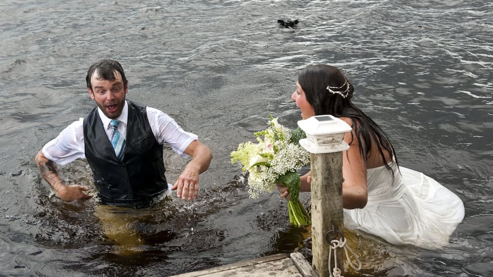 Drowning in love: Bride, groom fall into river during photoshoot after romantic dance move backfires