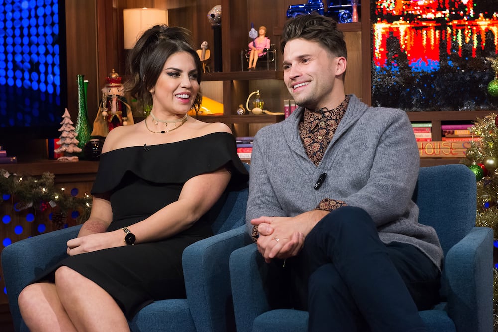 Katie Maloney and Tom Schwartz sitting on a couch.
