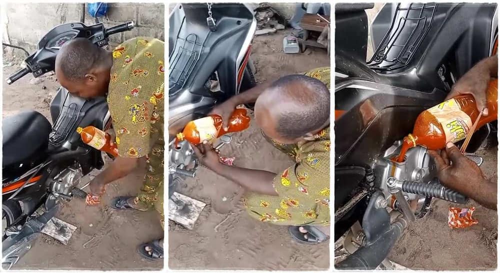 Man pours palm oil into motorcycle as lubricant.