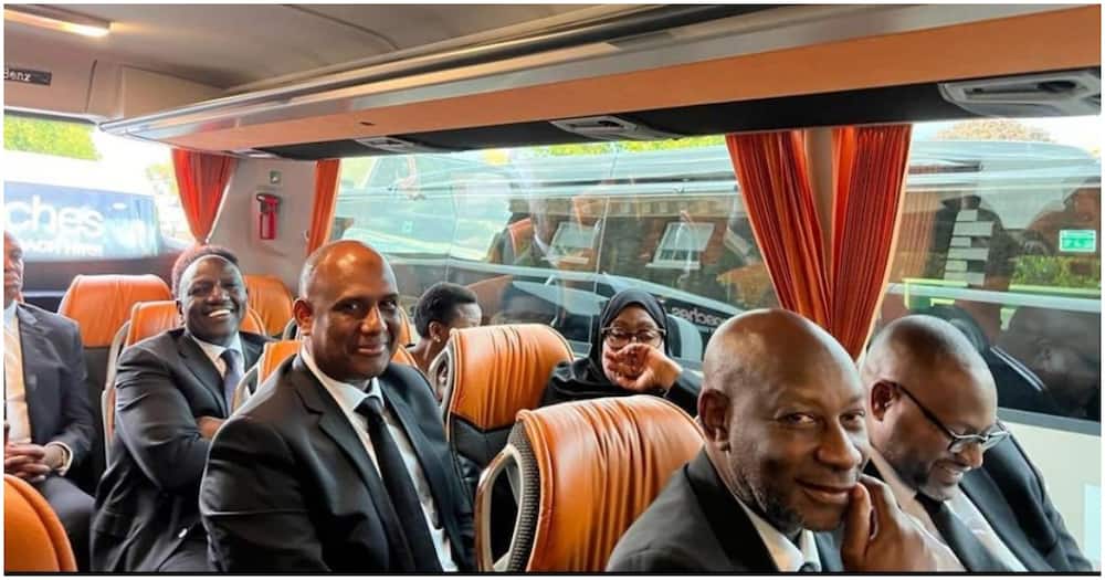 African leaders on a bus.