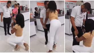 Lady Causes Stir at Boyfriend's Workplace After Showing up Unexpectedly to Propose to Him