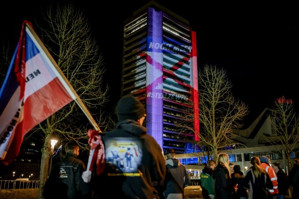 Dutch farmers protested outside a leaders' debate on the eve of the election