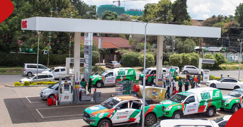 Cars fuel at one of Rubis Energy Kenya's petrol stations.