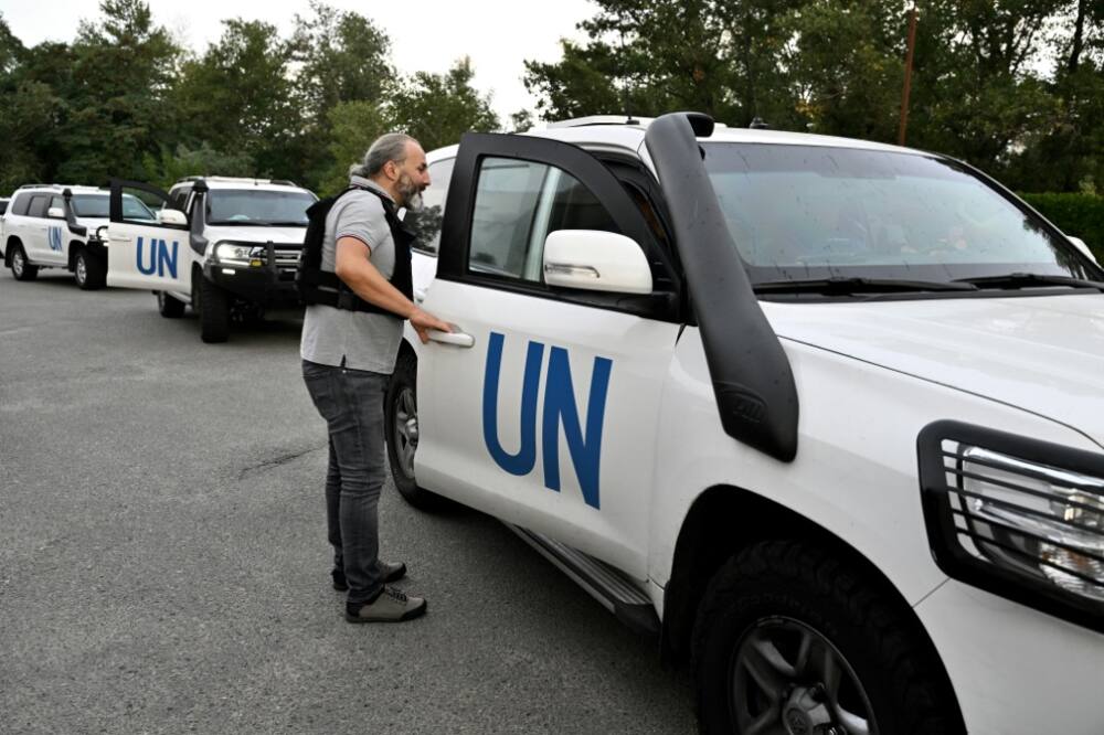 United Nations vehicles carry inspectors around the Russian-held Zaporizhzhia nuclear plant in Ukraine on September 1, 2022