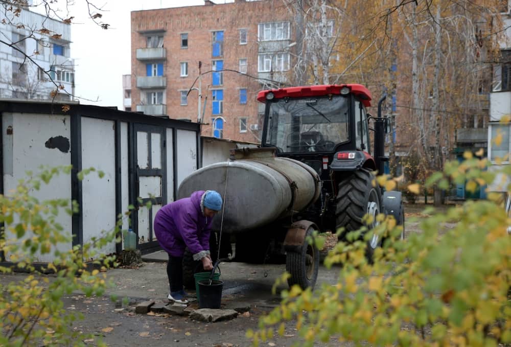 Yevgen Gamiy's tractor is the main source of water for the basement dwellers of Stepnogirsk