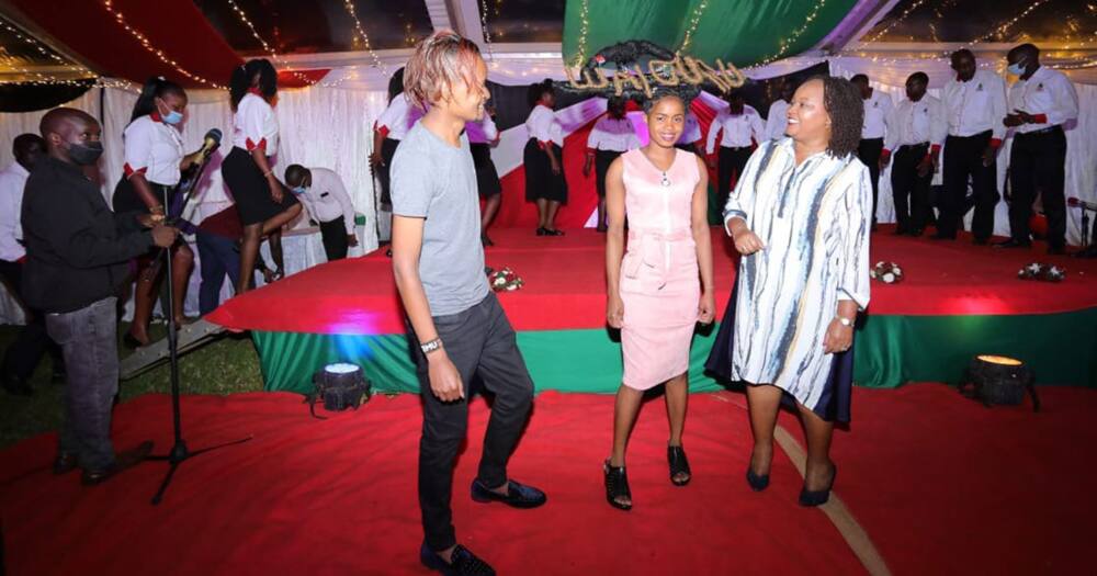 Temu Awoo with Waiguru.