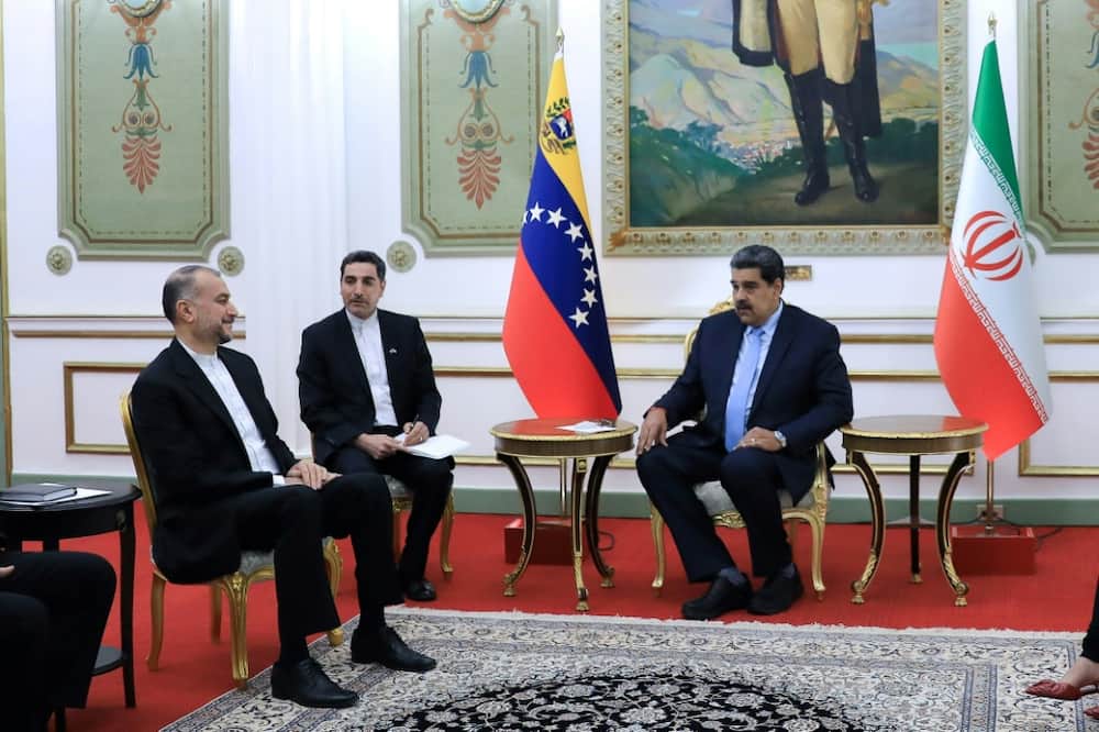 Venezuelan President Nicolas Maduro (R) meets with Iranian Foreign Minister Hossein Amir-Abdollahian (L) at the presidential palace in Caracas on February 3, 2023