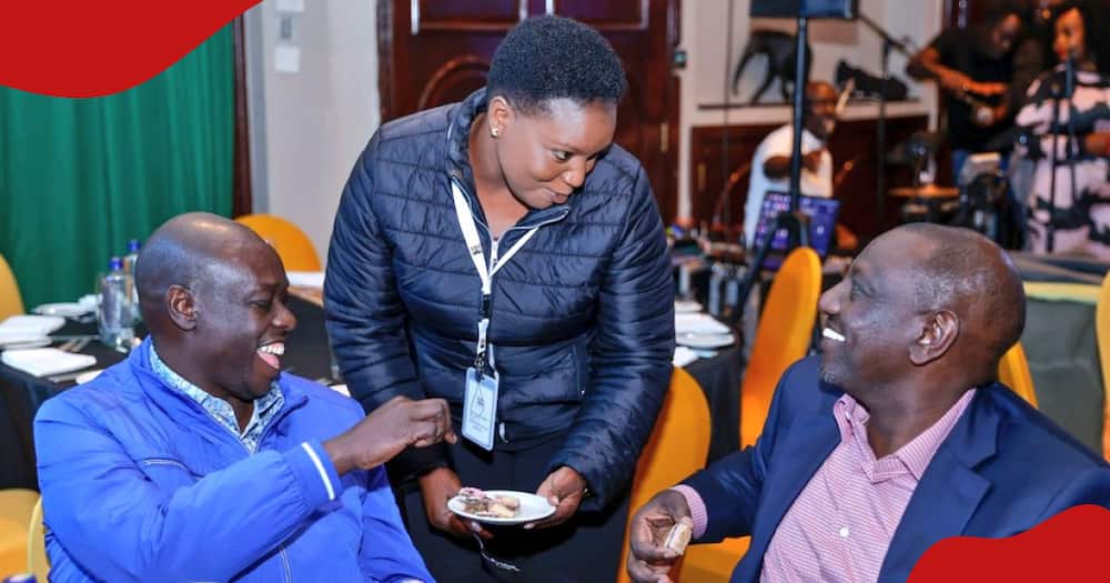 Health CS Susan Nakhumicha (centre) shares birthday cake with Deputy President Rigathi Gachagua (left) and President William Ruto (right).