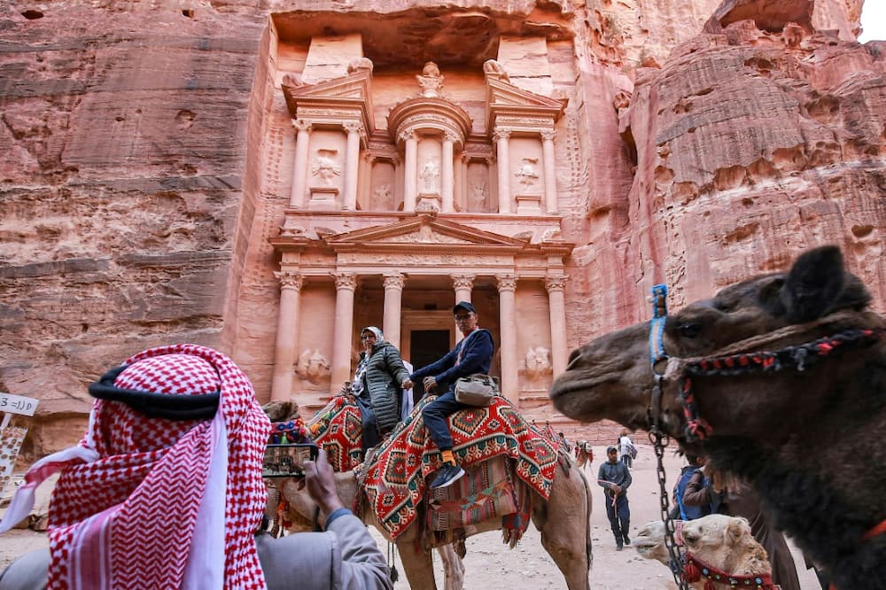 Famous for its stunning structures hewn out of the rose-pink cliff faces, Petra is a United Nations World Heritage site