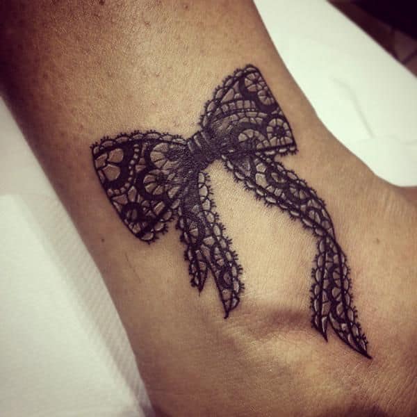 black lace bow tattoo