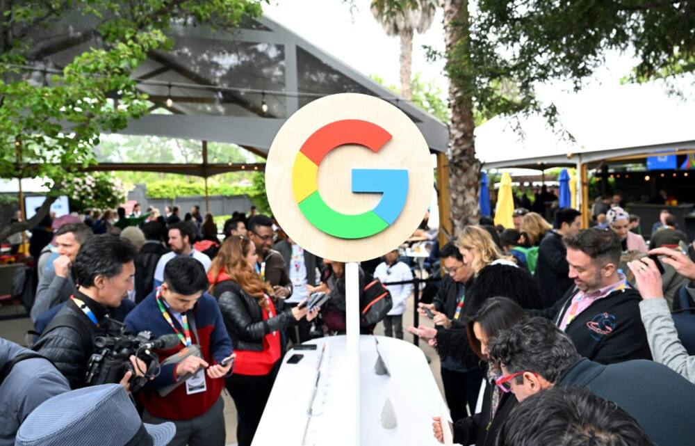 Visitors test Google's new products at an annual developers conference in May 2023