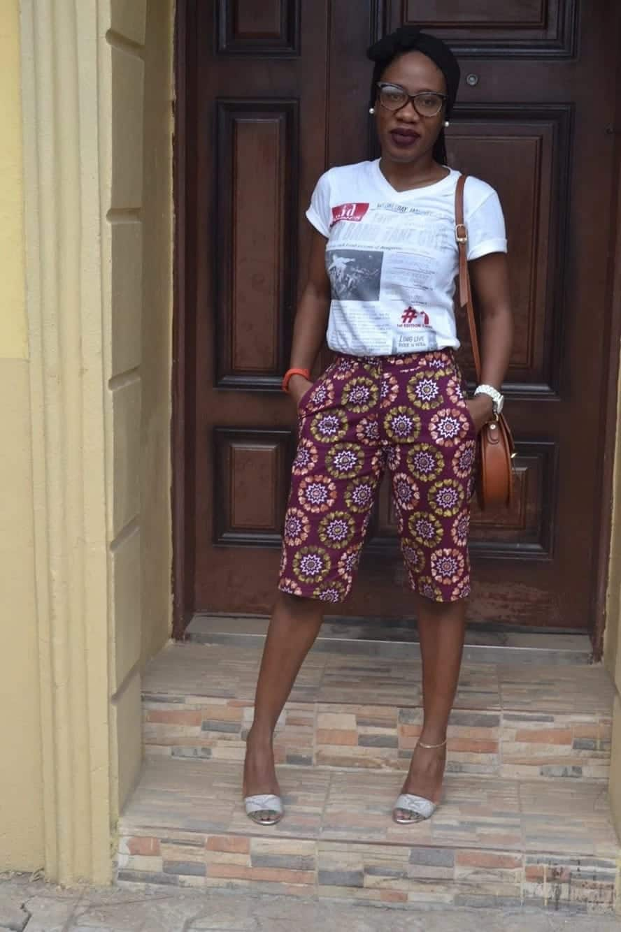 Clipkulture | Three Quarter Ankara Shorts With Belt and White Vest