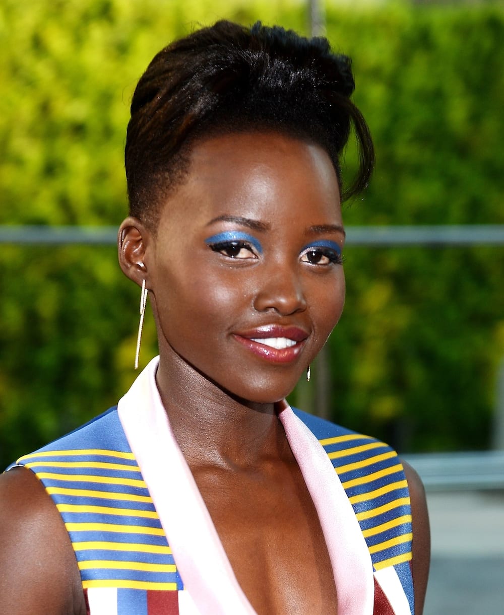 Lupita Nyong’o steals the show at the Oscars with stunning feather costume