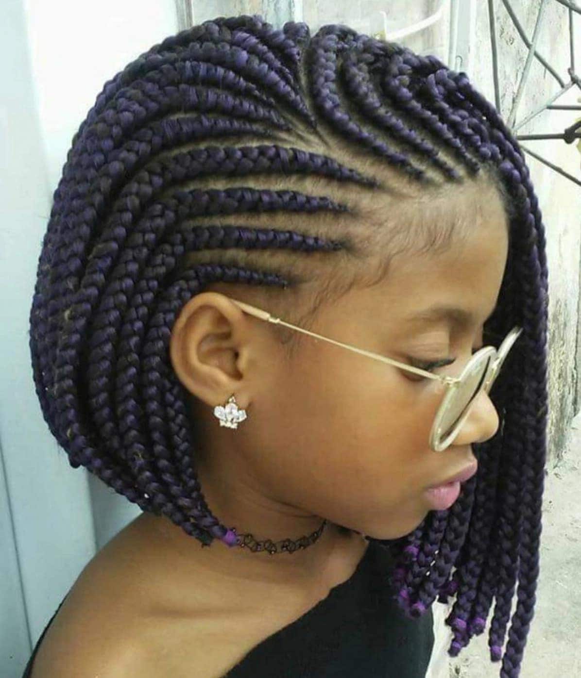 Ghanian Lines & Braids | A happy client served; Ghanian Lines in the front,  braids in the back. The braids were curled with hot water and styled. All  for KES1000 as a