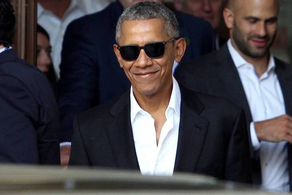 Barack Obama sports MOVIE-STAR looks during visit to fashion capital of ...