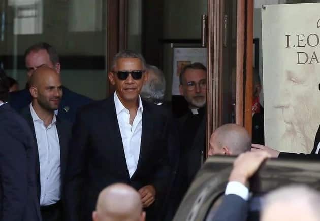 No tie, dark sunglasses and a loosened shirt: Barack Obama's new relaxed look