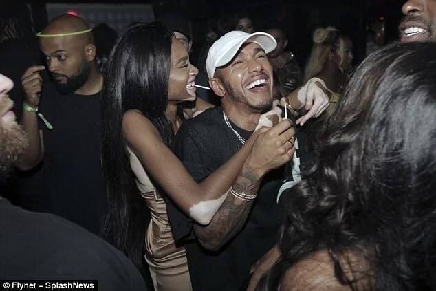 Winnie pictured partying with Formula 1 star Lewis Hamilton. Photo: Flynet/SpashNews