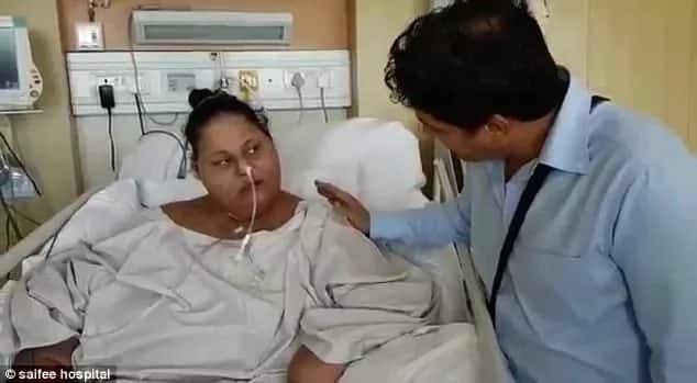 World's heaviest woman sits up for first time after losing HALF her 500kg weight (photos)