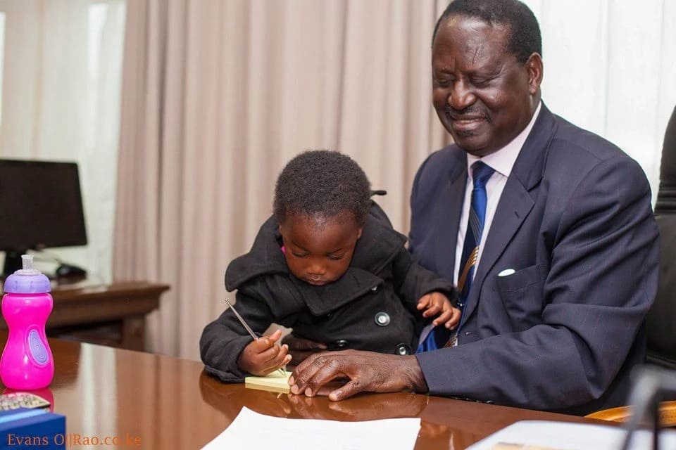 Raila Odinga spends time with grand-daughter in his office