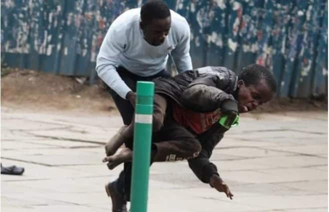 Journalist wins Kenyans' hearts by saving disabled man from swarm of bees