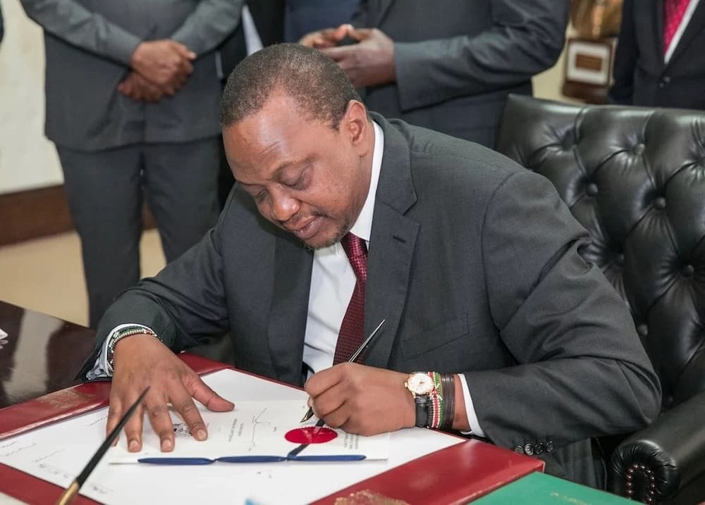 Uhuru signs the Finance Bill 2018 into law hours after chaotic debate in parliament