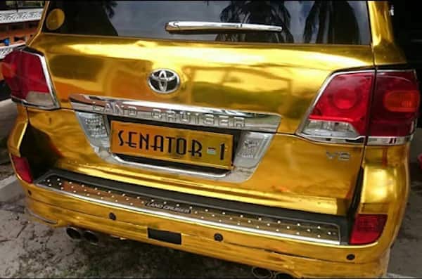 Many of the cars have personalized plates