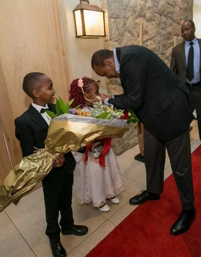 18 pictures showing Uhuru Kenyatta cares for children Tuko ...