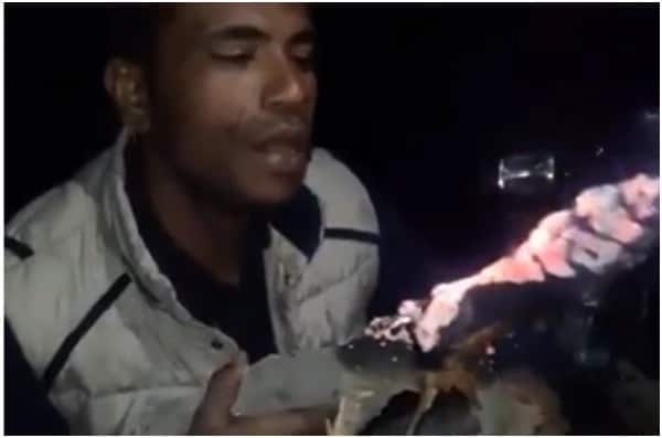 Man excites the internet by eating fire