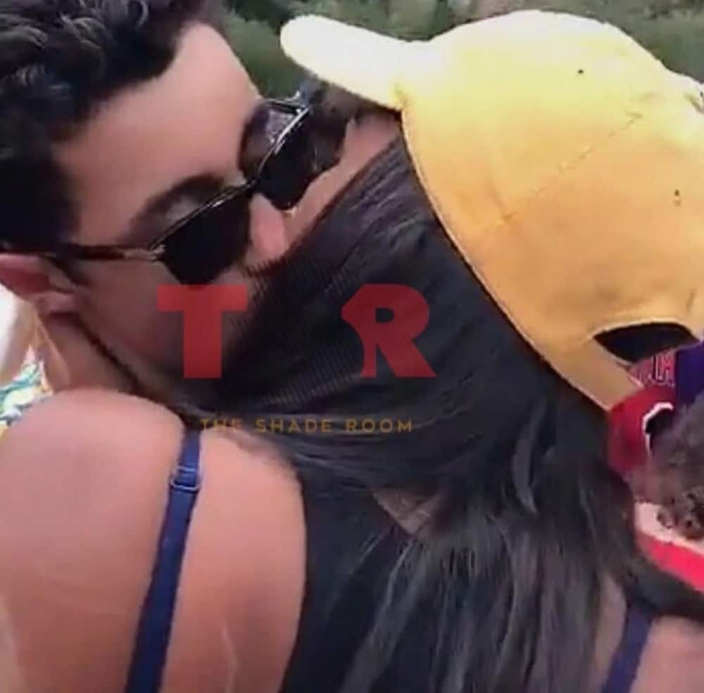 The two were pictured sharing a passionate kiss. Photo: Instagram/The Shade Room