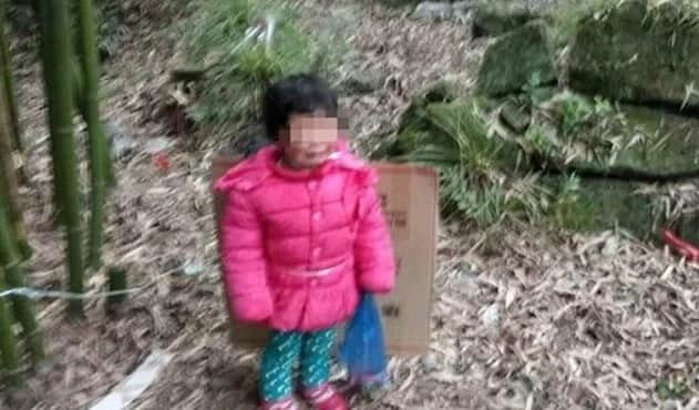 Father ties girl to bamboo canes and abandons her in GRAVEYARD at midnight (photos)