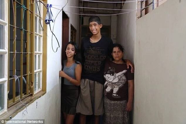 Gabriel pictured with his mother and a family member. Photo: International Networks