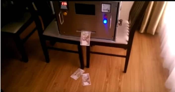 Viral video of a machine printing money at a private residence