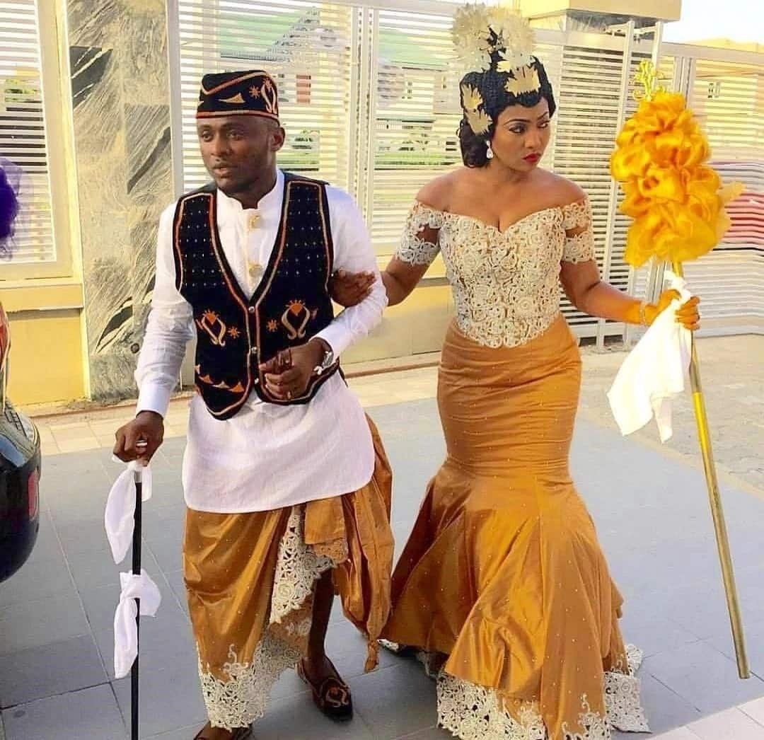 traditional wedding attire for bride and groom