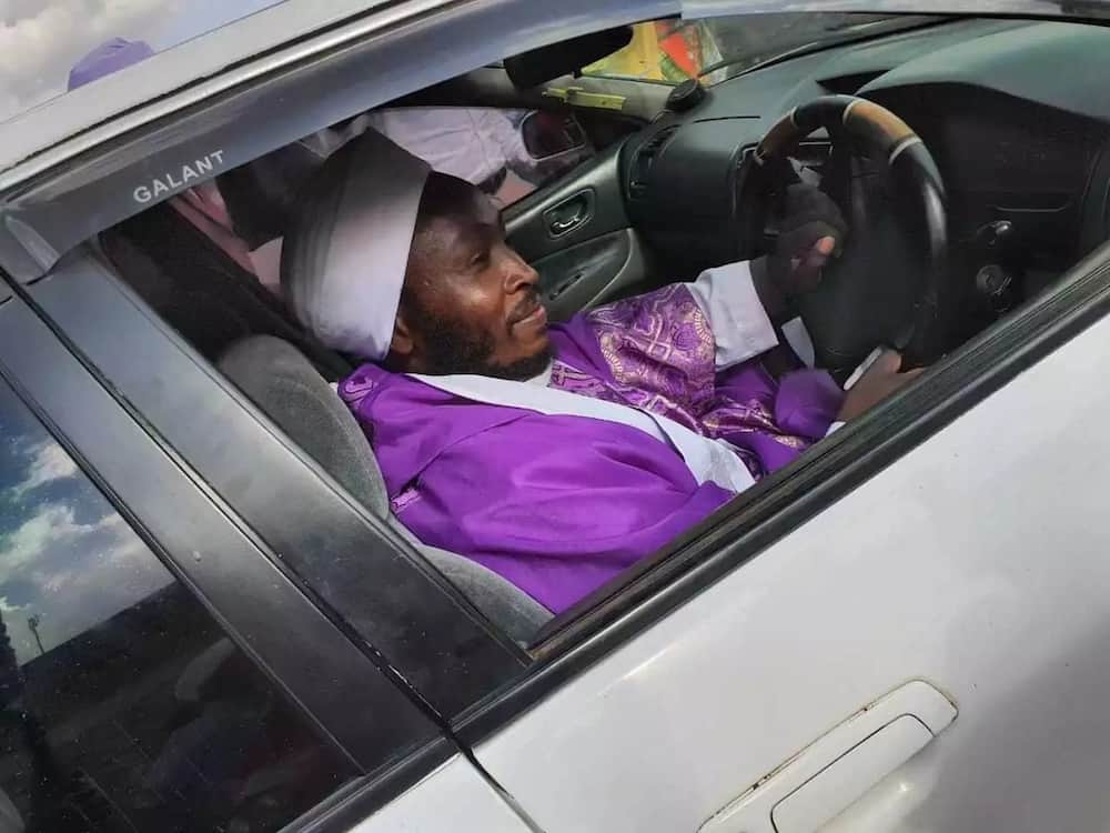 The Bishop who appeared to also share in the joy, went behind the wheel of the well maintained, white Mitsubishi Galant for a test drive. Photo: TUKO.co.ke