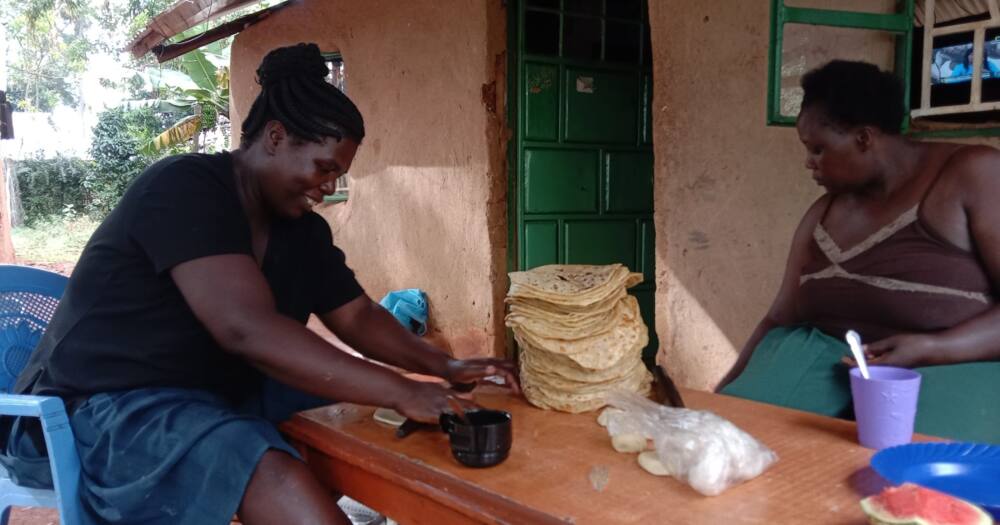 Women baking chapati.