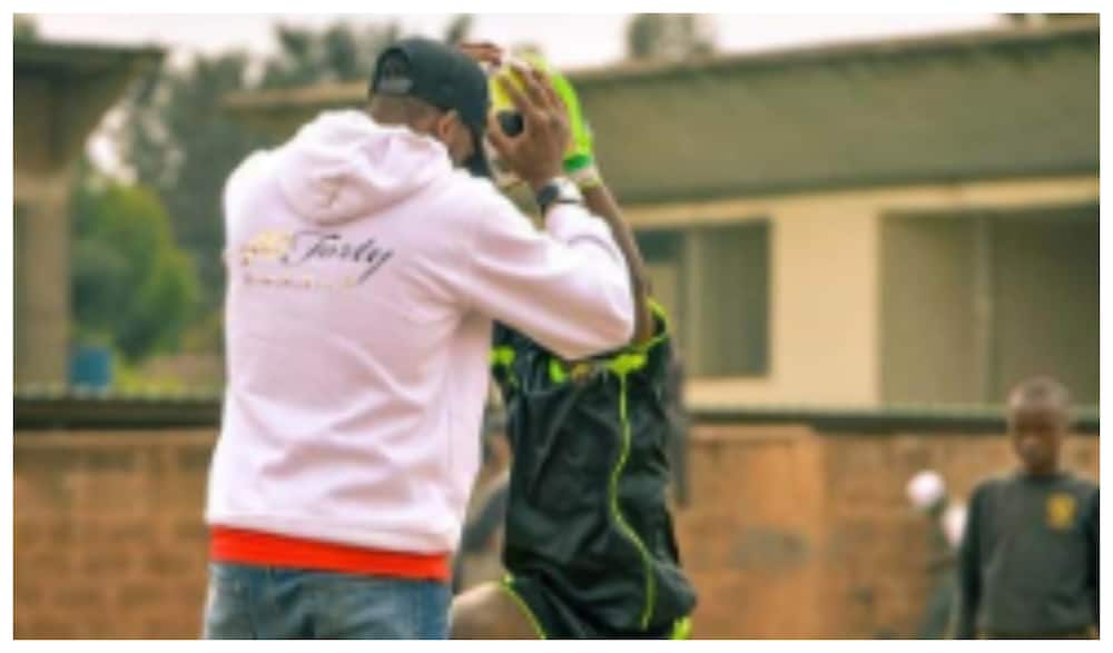 Delight as Kenya goalkeeping legend Matthew Ottamax buys young Mathare goalie new gear