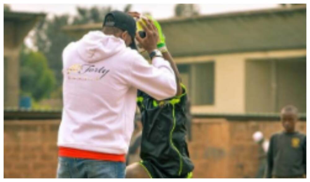 Delight as Kenya goalkeeping legend Matthew Ottamax buys young Mathare goalie new gear