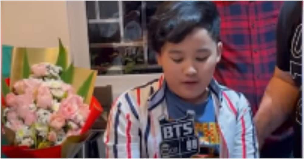 Tears of joy: 10-year-old boy emotional after family surprises him with money cake, iPhone on his birthday