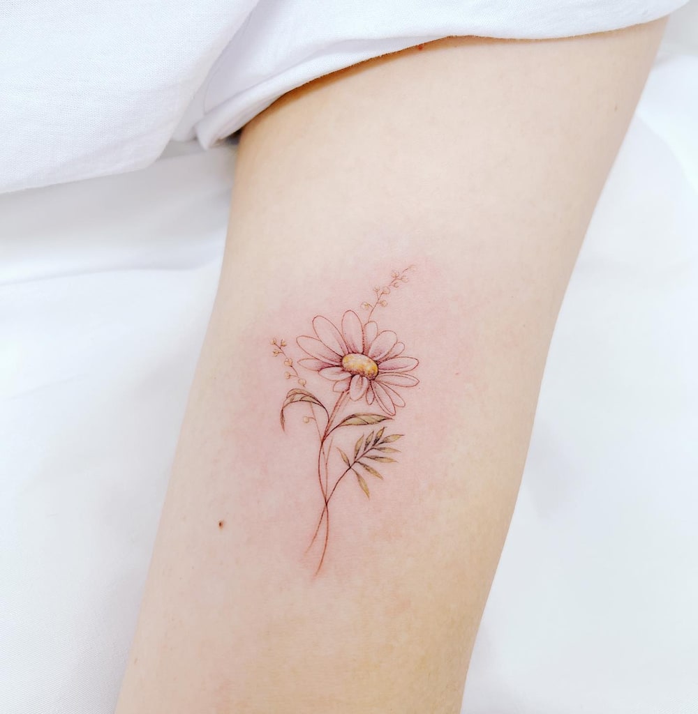 daisy foot tattoos