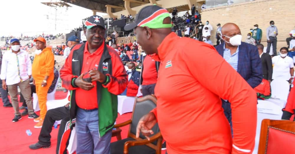 Raila Odinga dons William Ruto's signature cap as duo share podium