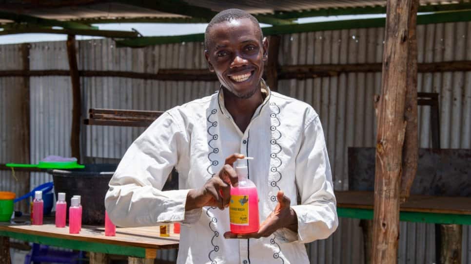 Refugee making soap in Kakuma camp lowers price to make it affordable during pandemic