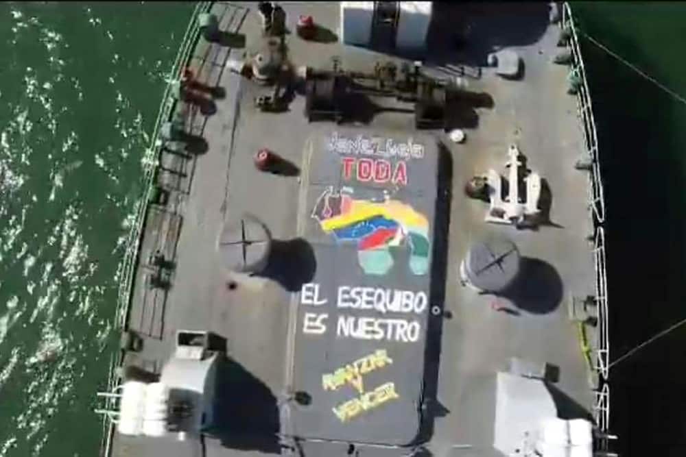 A Venezuelan frigate taking part in military exercises in 2023 is adorned with a pro-Essequibo message